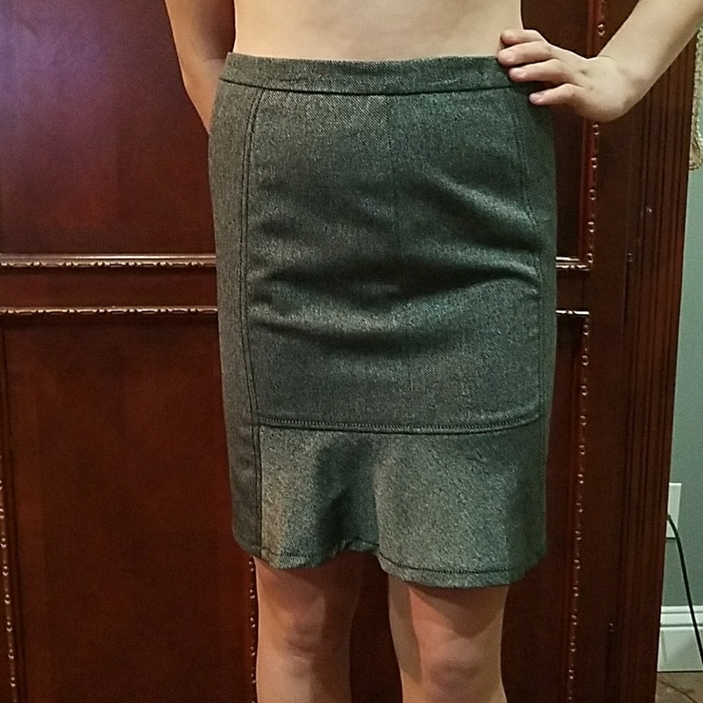 Just above knee skirt. Can be worn for work.